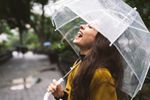 woman laughing in the rain