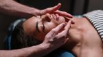 woman receiving craniosacral massage