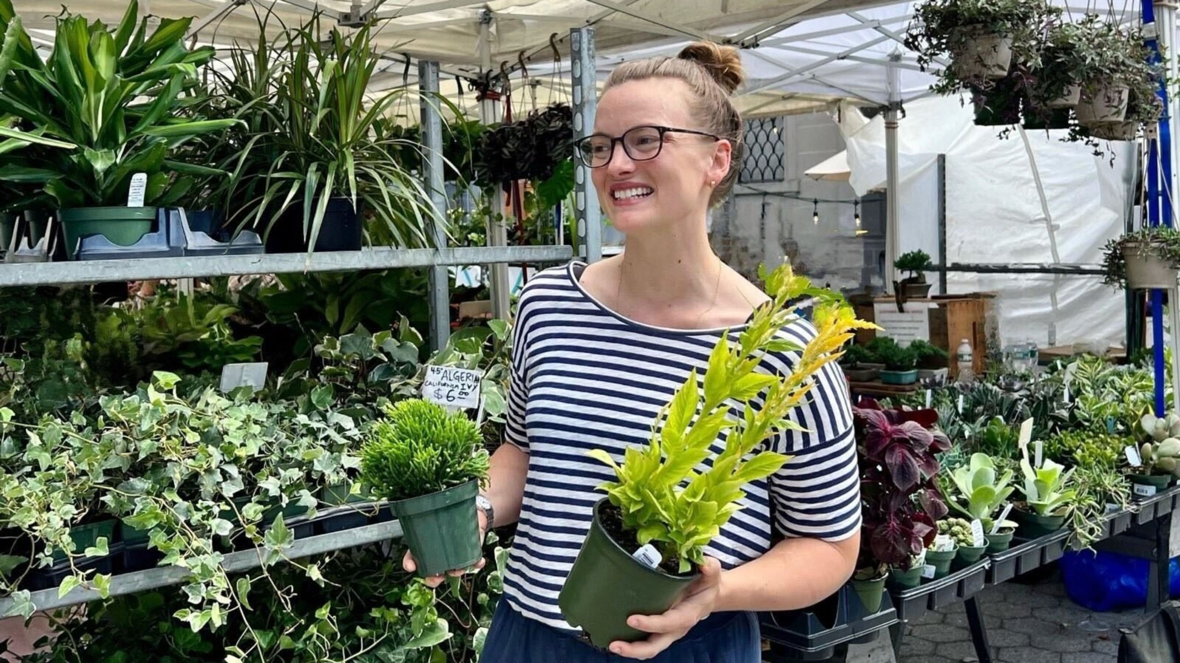Laura Allen with plants at local farmers market 