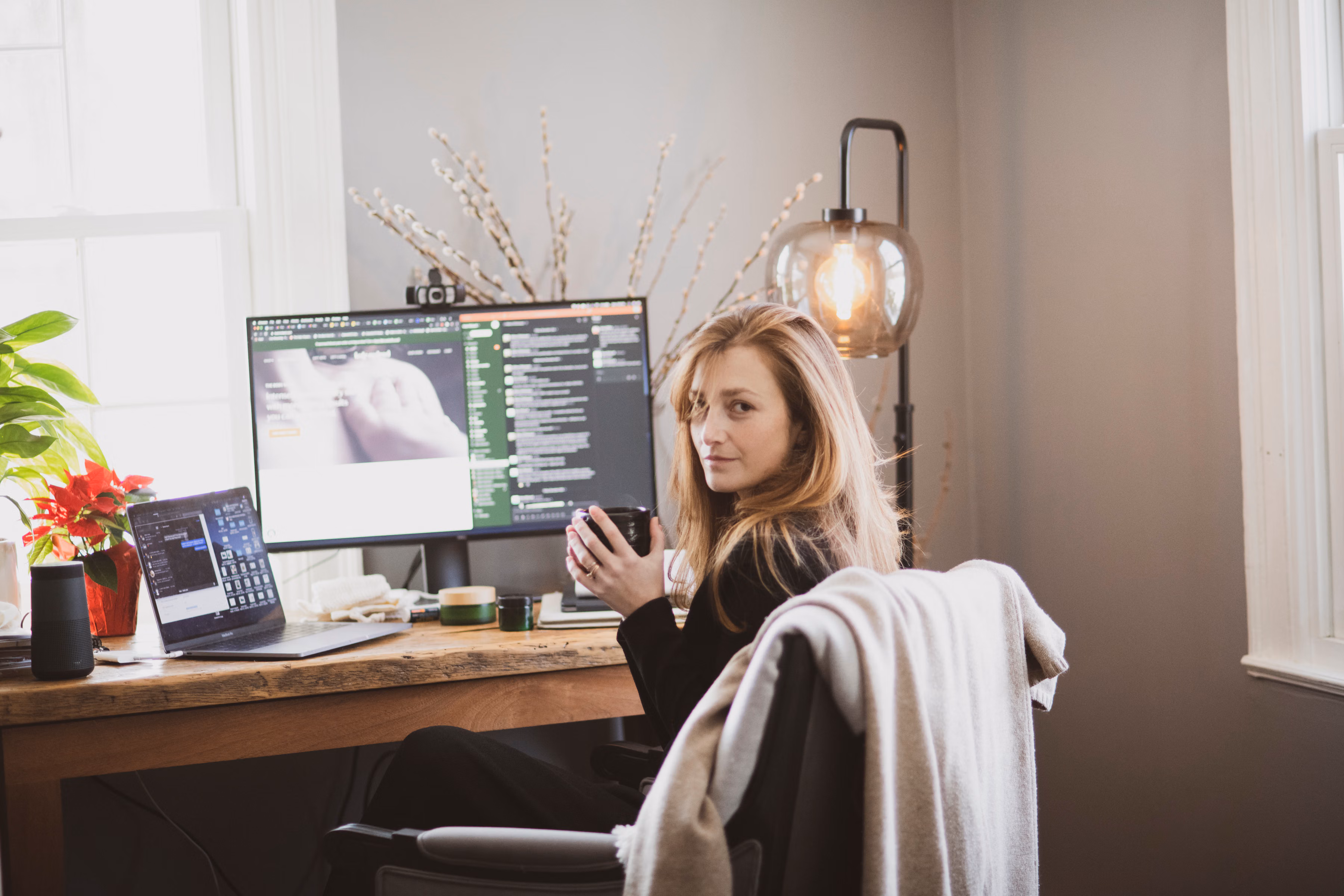 Kate McLeod sitting at her desk