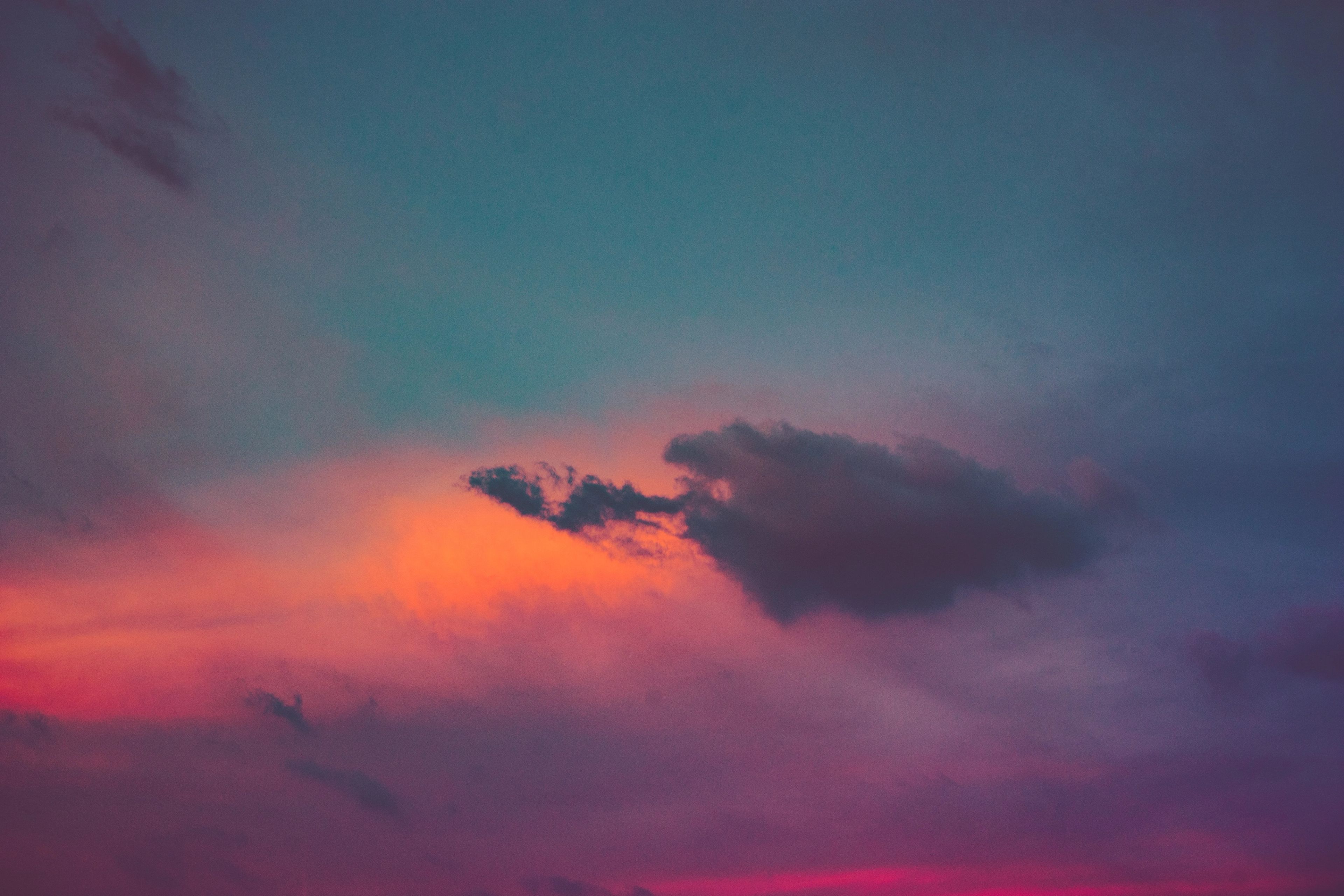 Colorful sunset sky with blues, pinks, oranges