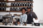 Alfonso and Jamila, founders of Brooklyn Tea in their store
