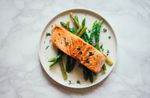 A plate of salmon and asparagus