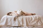 Woman sleeping with pillow