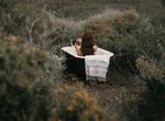 woman in outdoor bathtub