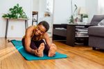 woman doing yoga at home