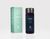 On the left there is a mint green short and rectangular box with a label that reads Release, switch off, settle in and relax BODY OIL, BUDDHA WOOD LAVENDER, THE WELL logo and 100ml/3.4oz. On the right of the box is a dark-tinted bottle with a black seal and a navy-colored label that reads relax BODY OIL, BUDDHA WOOD LAVENDER, THE WELL logo and 100mi/3.4oz.