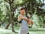 woman stretching outside