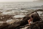 Woman on the beach thinking about life