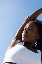 Woman smiling and stretching